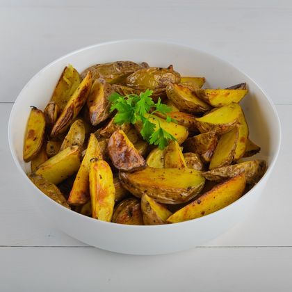 Картофель запеченый дольками 200гр