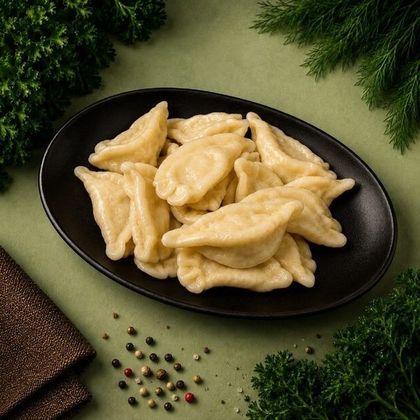 Вареники с картофелем, грибами и сметаной